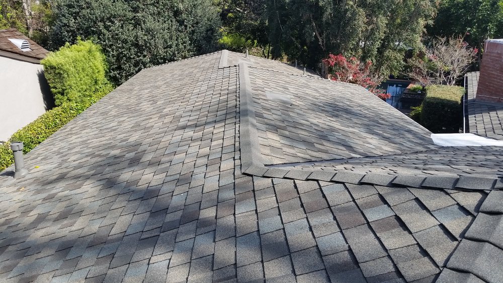 Slide of Ace Roofing Company