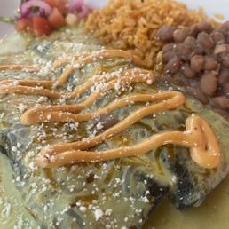 Crab enchiladas with a creamy jalapeño sauce