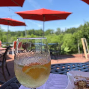 Tapa Rio - Dining on the patio with some of the sangria (white wine) - Tapas/Small Plates Near Me - Fredericksburg, Virginia Tapa Rio - Dining on the patio with some of the sangria (white wine) - Tapas/Small Plates Near Me - Fredericksburg, Virginia