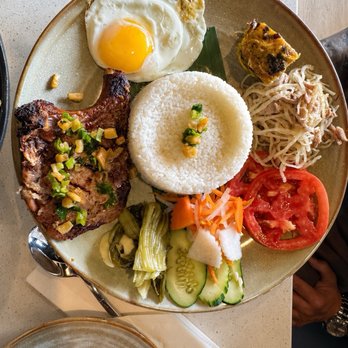 Tam Tam - BROKEN RICE WITH GRILLED PORK CHOP SHREDDED PORK, AND EGG - Vietnamese Near Me - Falls Church, Virginia Tam Tam - BROKEN RICE WITH GRILLED PORK CHOP SHREDDED PORK, AND EGG - Vietnamese Near Me - Falls Church, Virginia