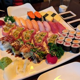 Triple delight, honey roll, assorted sushi - yum!