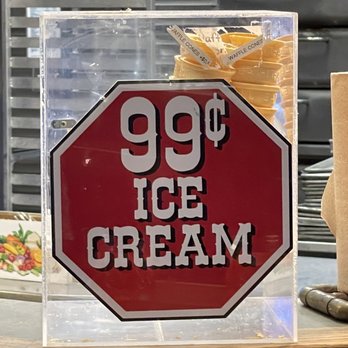 Fuddruckers - a stop sign with the words 99 99 ice cream - Burgers Near Me - Concord, California
