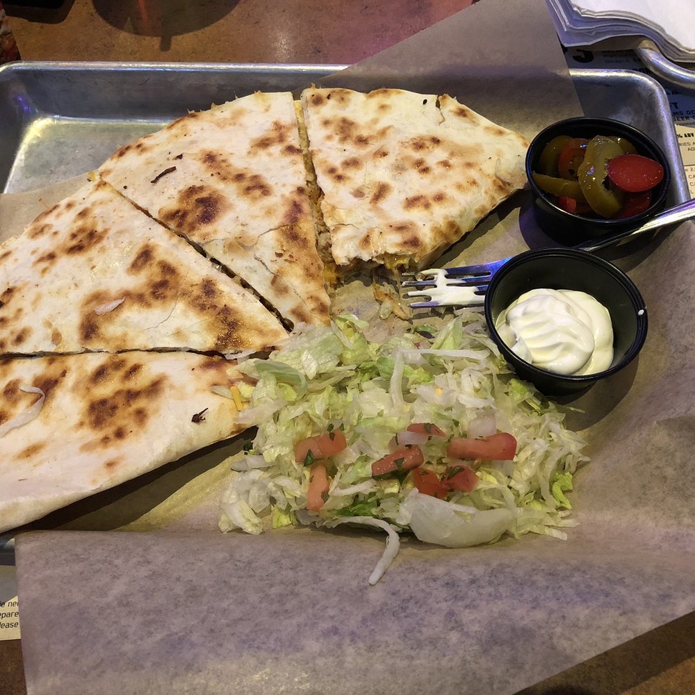 Quesadillas- missing salsa fresh jalapeños requested and even a knife. It's sprinkled with 3 to 5 tomato bits Quesadillas- missing salsa fresh jalapeños requested and even a knife. It's sprinkled with 3 to 5 tomato bits