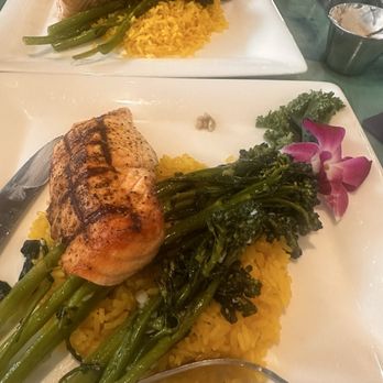 Deep Lagoon - Grilled salmon with broccoli and yellow rice - Seafood Near Me - Naples, Florida Deep Lagoon - Grilled salmon with broccoli and yellow rice - Seafood Near Me - Naples, Florida