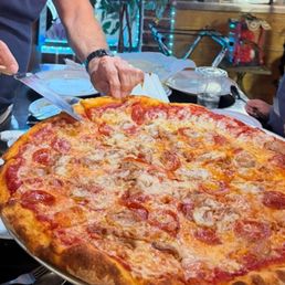 Pepperoni and sausage pizza. Delicious but overpriced and waited for over an hour.
