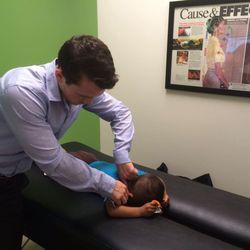Renovation Chiropractic - Kids getting adjusted- not cracked!