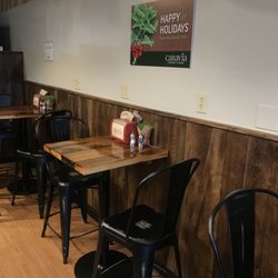 Caravia Fresh Foods - Bistro tables inside.