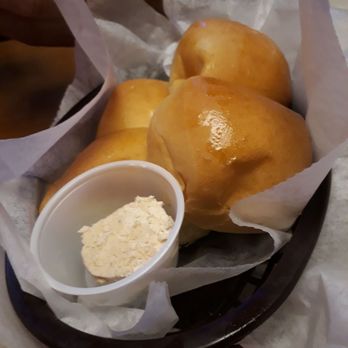 Texas Roadhouse - The bread! They walk you to the table with the basket in hand. - Steakhouses Near Me - Oceanside, California Texas Roadhouse - The bread! They walk you to the table with the basket in hand. - Steakhouses Near Me - Oceanside, California