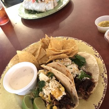 Roosters - Carnitas taco plate with mango habanero salsa & a side of queso and chips - Tacos Near Me - Mobile, Alabama Roosters - Carnitas taco plate with mango habanero salsa & a side of queso and chips - Tacos Near Me - Mobile, Alabama