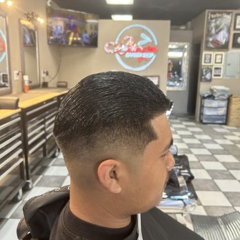 Chingon Barbershop - Mid fade slick back - Barbers Near Me - Ontario, California Chingon Barbershop - Mid fade slick back - Barbers Near Me - Ontario, California