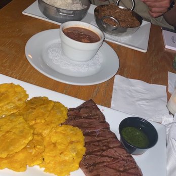 Asere Cubano Kitchen & Bar - Churasco and tostones / Ropa vieja with rice and beans - Cuban Near Me - San Juan, Puerto Rico Asere Cubano Kitchen & Bar - Churasco and tostones / Ropa vieja with rice and beans - Cuban Near Me - San Juan, Puerto Rico