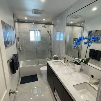 Perry Mason-ry - a bathroom with two sinks and a shower - General Contractors Near Me - Anaheim, California Perry Mason-ry - a bathroom with two sinks and a shower - General Contractors Near Me - Anaheim, California