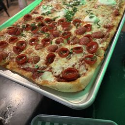 Half pepperoni and half cheese pizza Half pepperoni and half cheese pizza