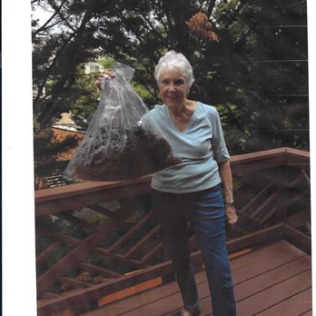 Safe House - wife holding trash removed from dryer vent - Damage Restoration Near Me Safe House - wife holding trash removed from dryer vent - Damage Restoration Near Me
