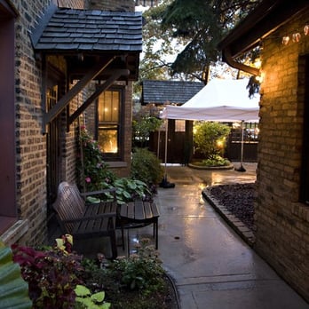 Bistro Campagne - looking towards the front garden (tent was ONLY for wedding nite) - French Near Me - Chicago, Illinois Bistro Campagne - looking towards the front garden (tent was ONLY for wedding nite) - French Near Me - Chicago, Illinois
