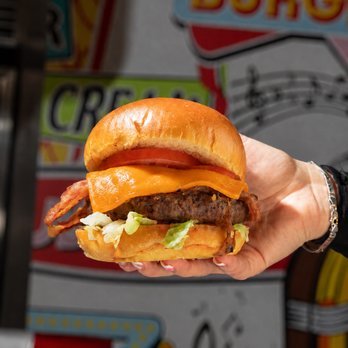 Jukebox Burgers - Cowboy Burger
FR: bacon croustillant, cheddar fondant et une bonne dose de caractère.
EN: crispy bacon, melted cheddar & bold flavour. - Burgers Near Me - Laval, Quebec Jukebox Burgers - Cowboy Burger
FR: bacon croustillant, cheddar fondant et une bonne dose de caractère.
EN: crispy bacon, melted cheddar & bold flavour. - Burgers Near Me - Laval, Quebec