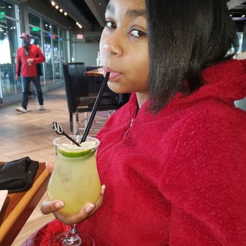 Topgolf - My niece with a margarita mocktail - Golf Near Me - Fishers, Indiana Topgolf - My niece with a margarita mocktail - Golf Near Me - Fishers, Indiana