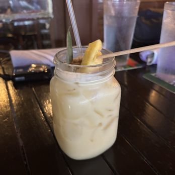 The Cottage - Pain killer drink - New American Near Me - Sarasota, Florida The Cottage - Pain killer drink - New American Near Me - Sarasota, Florida