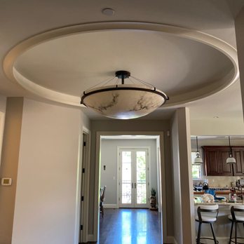 Piper Electric - While this looks small in the picture, it is 48" wide and 50#. The ceiling is 10' high. This was a tough job and they got it done! - Electricians Near Me - Arvada, Colorado