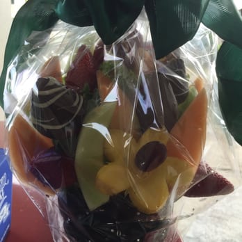 Blossoms Fruit Arrangements - Fruit arrangement, made it safe home. A picture without box. - beautiful.!!! - Flowers & Gifts Near Me - Honolulu, Hawaii