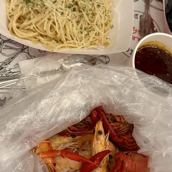 Cap't Loui - Lunch Special Seafood Boiler with garlic noodles, crawfish, and head on shrimp - Cajun/Creole Near Me - New York, New York Cap't Loui - Lunch Special Seafood Boiler with garlic noodles, crawfish, and head on shrimp - Cajun/Creole Near Me - New York, New York