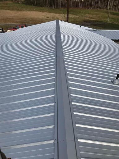 Slide of Quiroz Metal Roofing