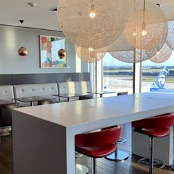 British Airways Galleries First Lounge - Seating area with high tops