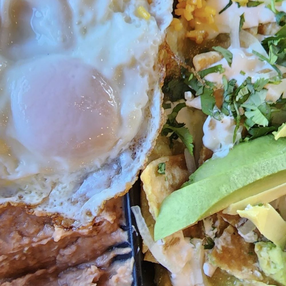 Taco Bamba Gaithersburg - Chilaquiles with green sauce and sunny side up egg. Delicious! - Tacos Near Me - Gaithersburg, Maryland Taco Bamba Gaithersburg - Chilaquiles with green sauce and sunny side up egg. Delicious! - Tacos Near Me - Gaithersburg, Maryland