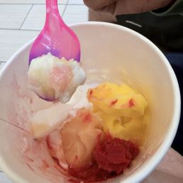 Coconut, pineapple, pomegranate and guava with a color changing spoon Coconut, pineapple, pomegranate and guava with a color changing spoon