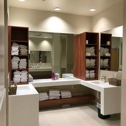 The Health Club at Southpointe - Locker Rooms with showers, complimentary towels, and sauna.