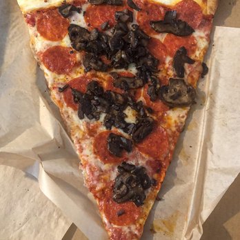 Talarico's Pizzeria - Slice of Pepperoni and Mushroom - Pizza Near Me - Seattle, Washington Talarico's Pizzeria - Slice of Pepperoni and Mushroom - Pizza Near Me - Seattle, Washington