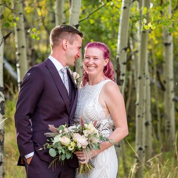 Nichole Emerson Photography - Couple smiles in an aspen forest near Granby Colorado. - Event Photography Near Me - Westminster, Colorado Nichole Emerson Photography - Couple smiles in an aspen forest near Granby Colorado. - Event Photography Near Me - Westminster, Colorado