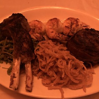 Ken Stewart's Grille - Trio special. Lamb, grilled shrimp and bacon wrapped filet. - Steakhouses Near Me - Akron, Ohio Ken Stewart's Grille - Trio special. Lamb, grilled shrimp and bacon wrapped filet. - Steakhouses Near Me - Akron, Ohio
