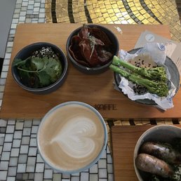 Avocado, bacon and broccolini. Latte and Christmas sausage at the bottom.