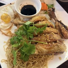 Crispy Fried Chicken Over Tossed Instant Noodle With Roasted Chicken Crispy Fried Chicken Over Tossed Instant Noodle With Roasted Chicken