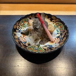 Yuji - Chilean sea bass with piece of truffle and pickled ginger on top