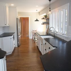 Distinctive Stone Interiors - Nero Orion Honed Granite Kitchen
