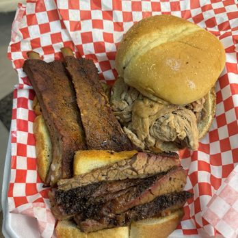 On Q Smokehouse Grill - 3 meat combo of ribs, brisket, and pulled pork sandwich with sweet potato fries & baked beans $22 (instagram: @issa.cheatday) - Smokehouse Near Me - St. Leo, Florida