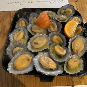 A Tasca - Grilled Lapas or limpets for €6. Tastes like a marriage of calamari and clams. Chewy. - Mediterranean Near Me - Ponta Delgada, 20 A Tasca - Grilled Lapas or limpets for €6. Tastes like a marriage of calamari and clams. Chewy. - Mediterranean Near Me - Ponta Delgada, 20