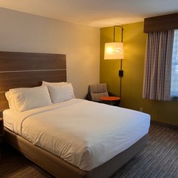 Holiday Inn Express - Double queen bedroom (one of two beds pictured) with reading nook