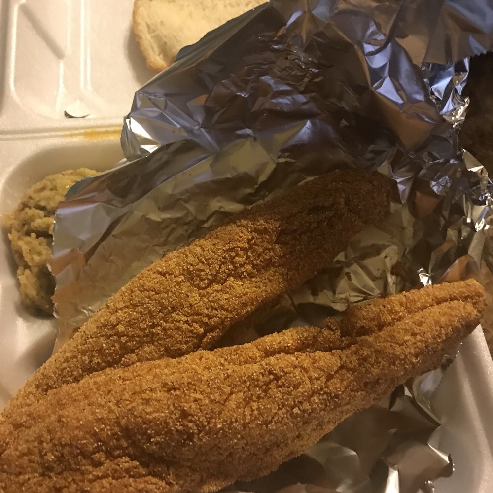 Richmond's - a tray of fried fish and bread - Soul Food Near Me - Milwaukee, Wisconsin Richmond's - a tray of fried fish and bread - Soul Food Near Me - Milwaukee, Wisconsin