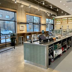 sweetgreen - Healthy Salads, Wraps, and Bowls - Large windows, bar seating and register