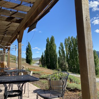 Tildio Winery - a patio with tables and chairs - Wineries Near Me - Manson, Washington Tildio Winery - a patio with tables and chairs - Wineries Near Me - Manson, Washington