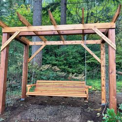 McKinney Residential - Custom cedar arbor build and stain with swing