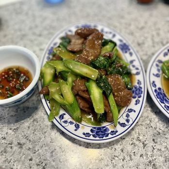Saigon - two plates of food on a table - Vietnamese Near Me - San Diego, California