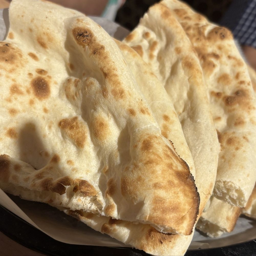 Nukkad Dhaba - Naan - 4 pieces is one naan. Good naan. - Indian Near Me - Houston, Texas Nukkad Dhaba - Naan - 4 pieces is one naan. Good naan. - Indian Near Me - Houston, Texas