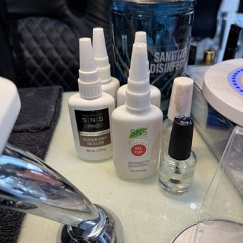Millennial Nails - Products that were mixed tg - Nail Salons Near Me - Brooklyn, New York