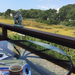 Beautiful breakfast off the back porch... Cool breeze right off the ocean. Can't have a better start to the day