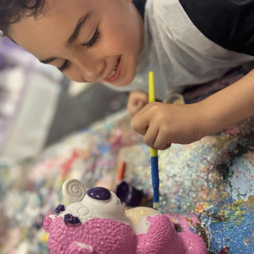 Plaster Carousel Fun Painting Studio - My son painting Lotso - Paint & Sip Near Me - Coral Springs, Florida Plaster Carousel Fun Painting Studio - My son painting Lotso - Paint & Sip Near Me - Coral Springs, Florida