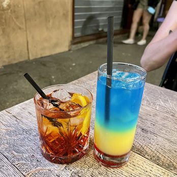 Coming Out - Pride drink (on the right). No clue what drink is on the left... - Gay Bars Near Me - Rome, RM